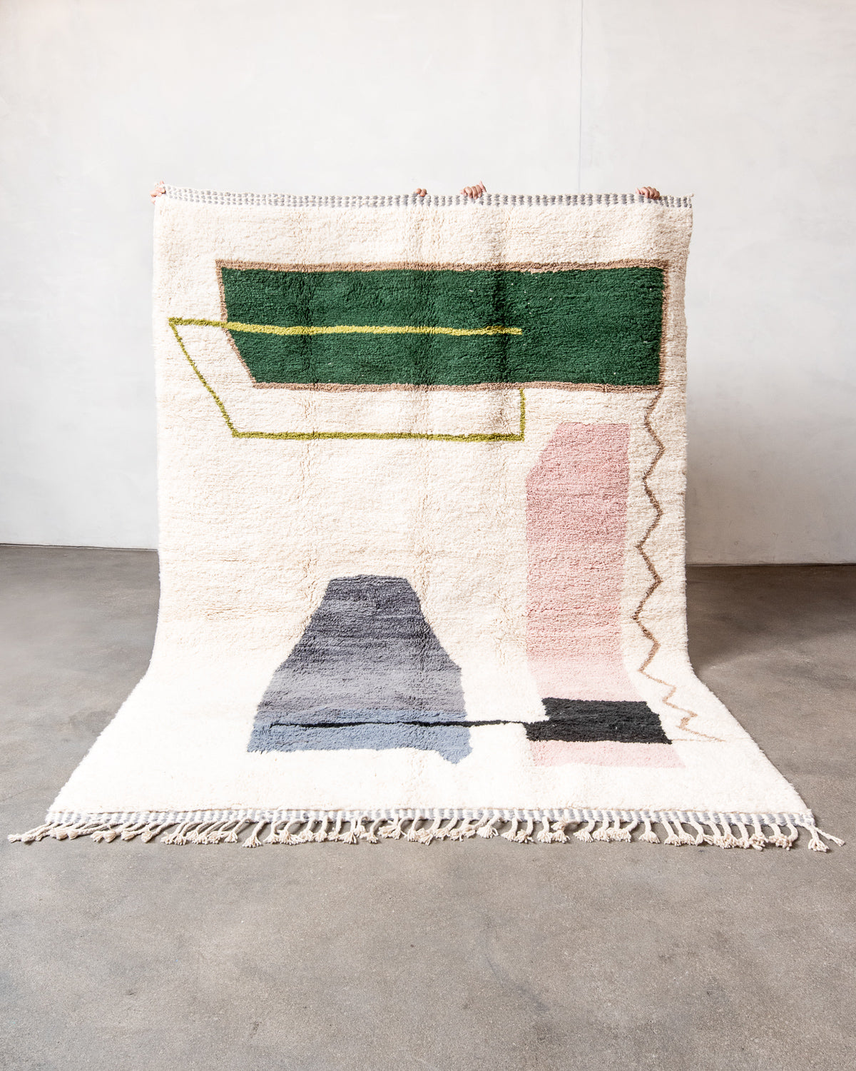 Modern, designer, handcrafted Berber rug from Morocco. Beniourain carpet with beautiful colours and patterns and fluffy wool texture.